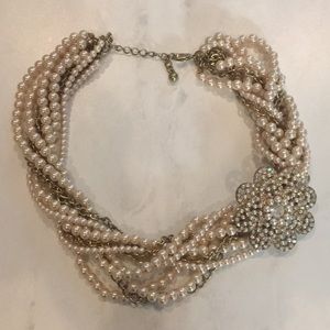 Woven Pearl and gold necklace with flower brooch.